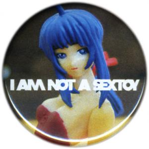 <b>Badge 1</b> - (I am not a sextoy), diamètre: 3,2 cm, édition: 50, 2008