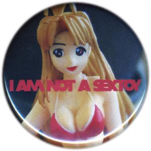 <b>Badge 4</b> - (I am not a sextoy), diamètre: 3,2 cm, édition: 50, 2008